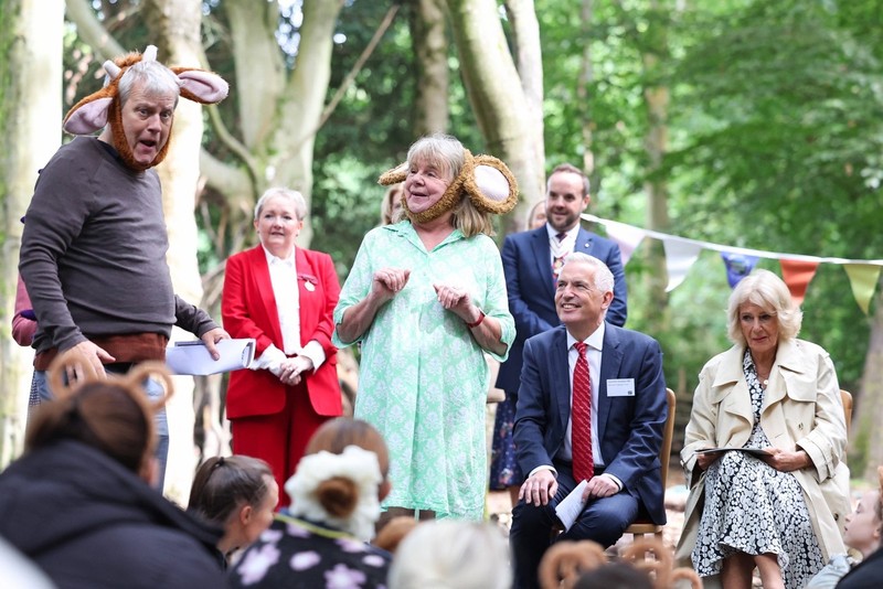 Donaldson und Scheffler kennen keine Scheu, hier zusammen mit Queen Camilla im September 2026.